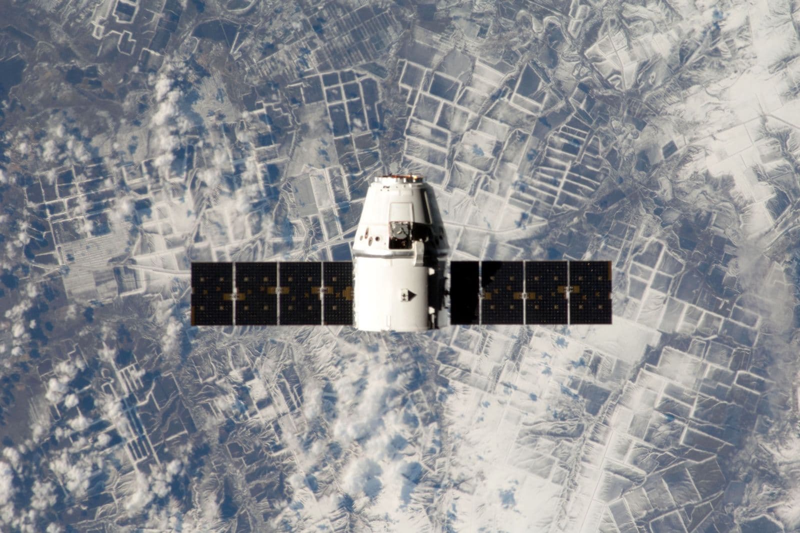Spacecraft and Earth seen from orbit